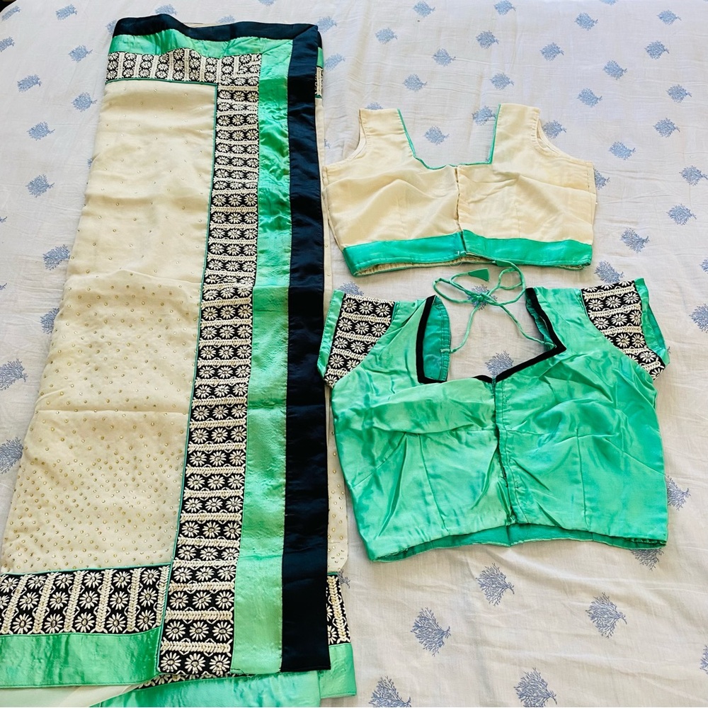 Saree with 2 blouses, White saree with turquoise and black satin borders